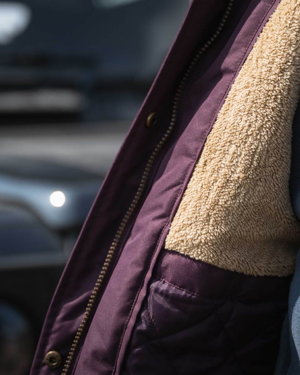 Black Berry Coloured Hoggs of Fife Womens Walker Long Coat on outdoor background 