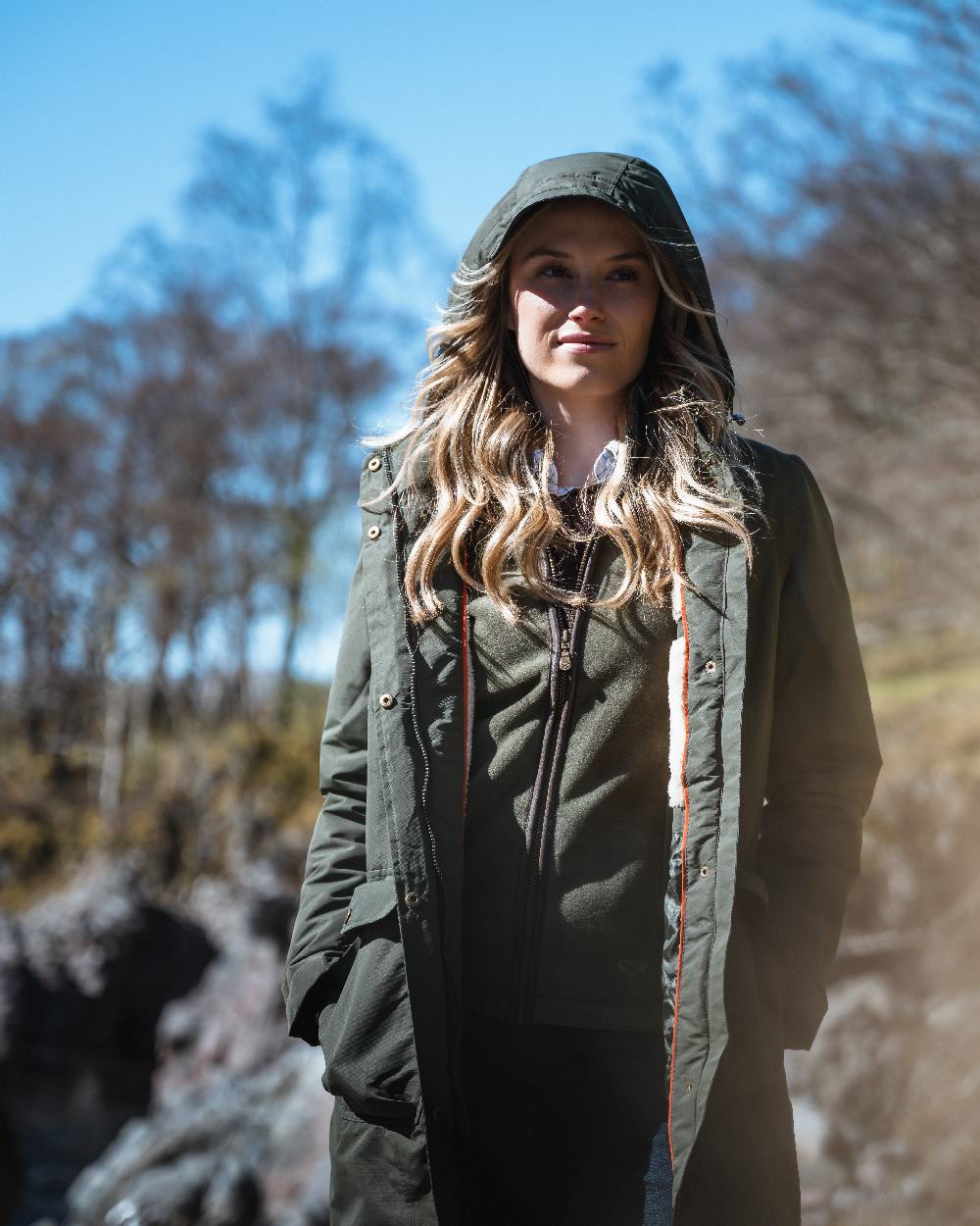 Green coloured Hoggs of Fife Womens Walker Long Coat on forest background 