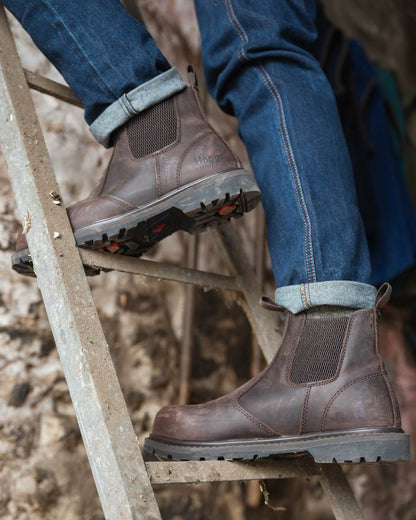 Crazy Horse Brown Coloured Hoggs of Fife Zeus Safety Dealer Boots on building background 