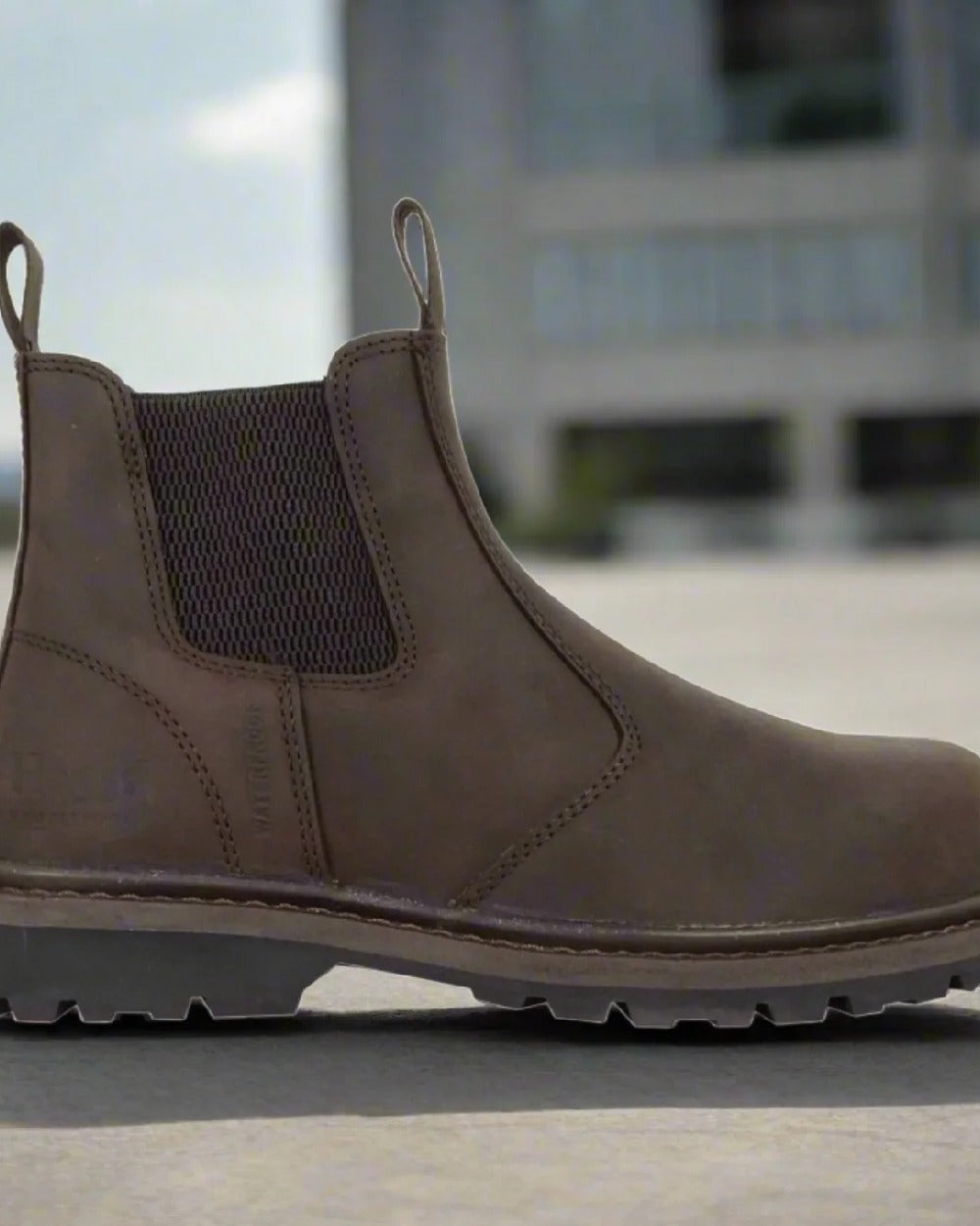 Crazy Horse Brown Coloured Hoggs of Fife Zeus Safety Dealer Boots on building background 