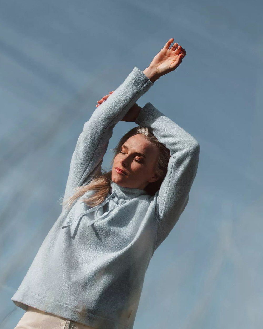 Illusion Blue Coloured Holebrook Womens Angelika Knitted Windproof Sweater on sky background 