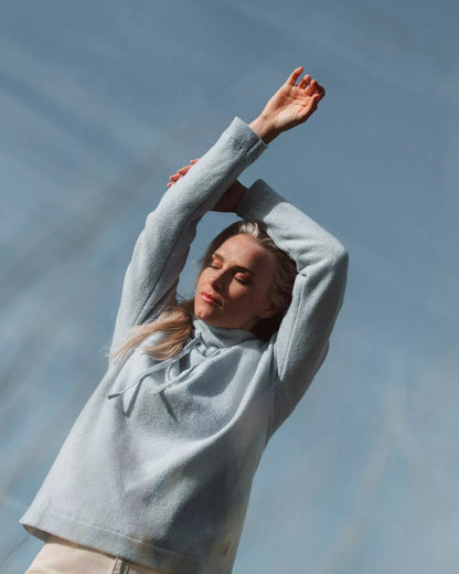 Illusion Blue Coloured Holebrook Womens Angelika Knitted Windproof Sweater on sky background 