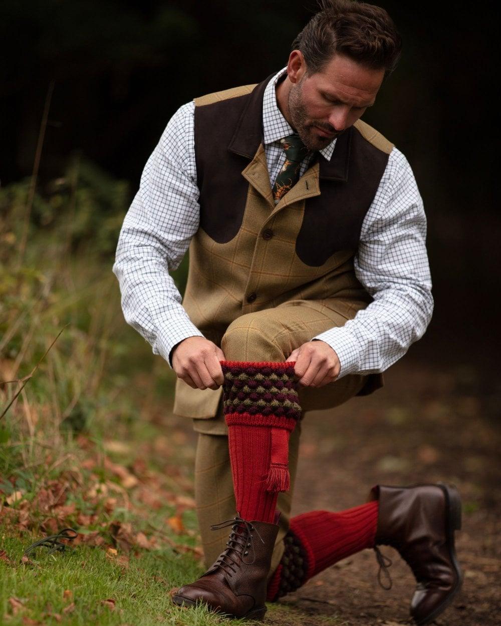 Chestnut coloured House of Cheviot Angus Socks on field background 