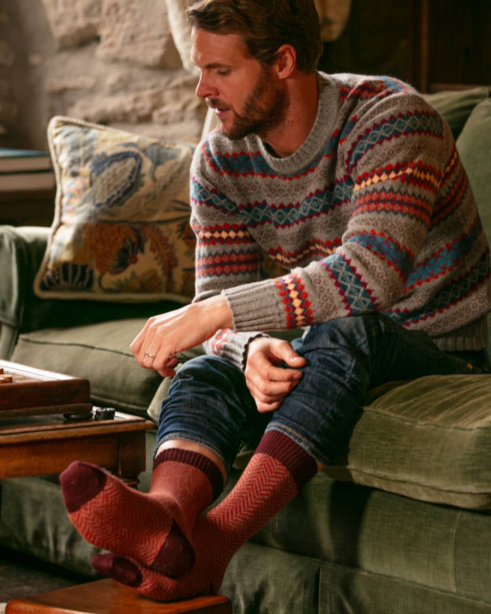 Mulberry coloured House of Cheviot Herringbone Short Socks on house background 