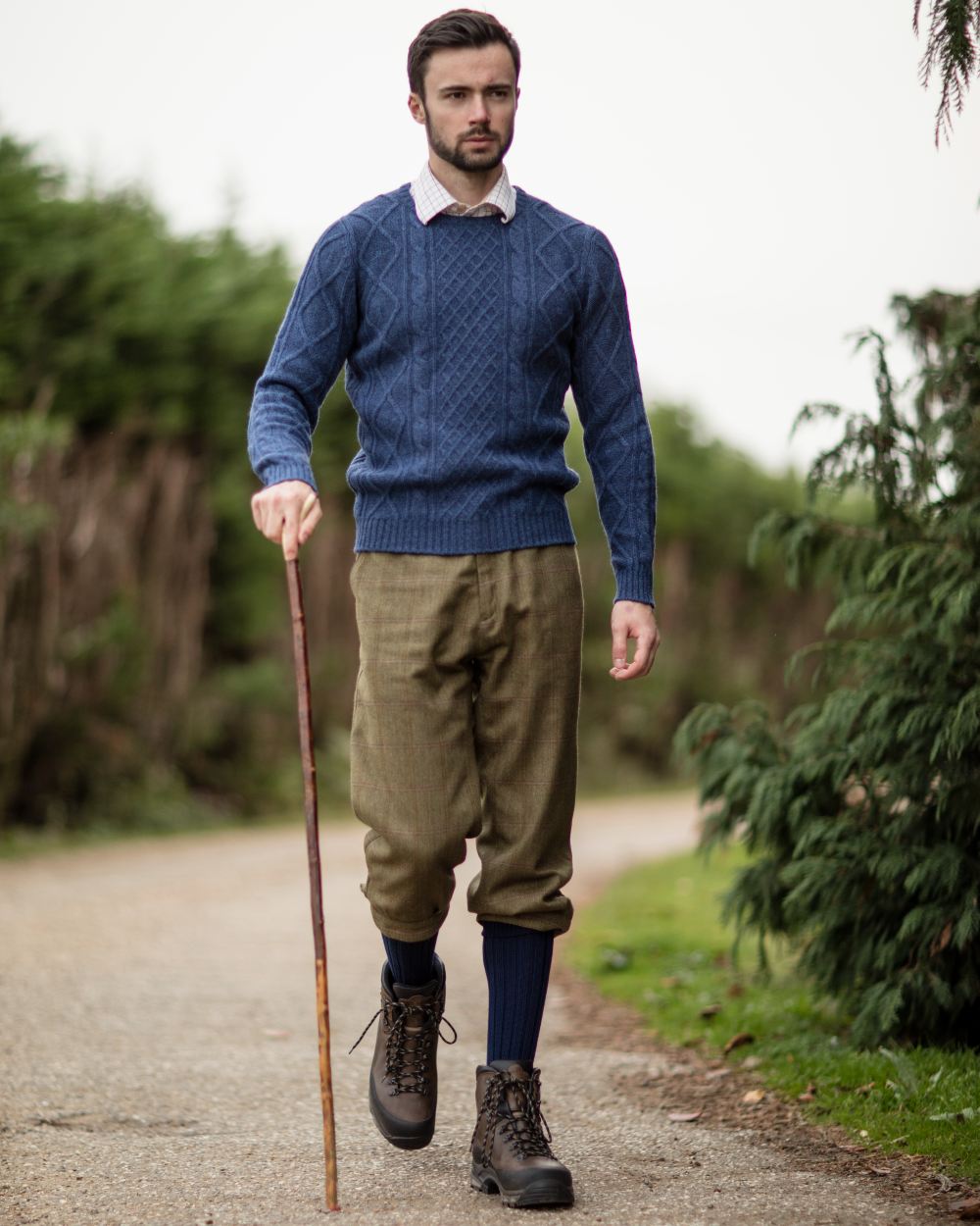 Navy coloured House of Cheviot Jura Socks on white background 