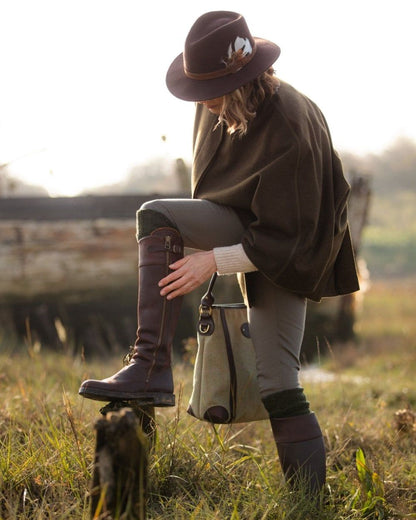 Spruce coloured House of Cheviot Lady Glenmore Socks on field background 