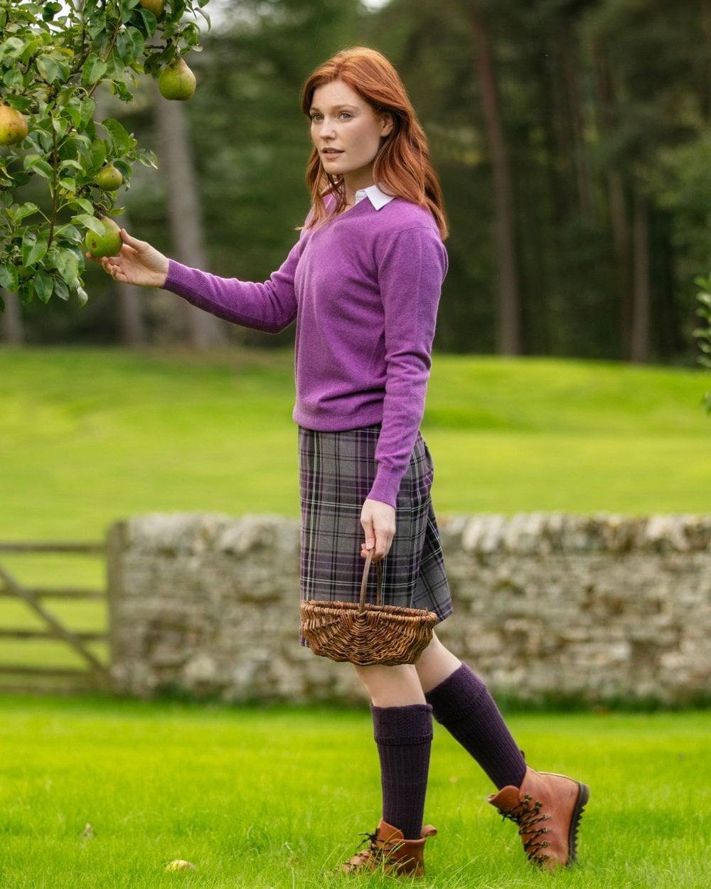 Thistle coloured House of Cheviot Lady Glenmore Socks on field background 