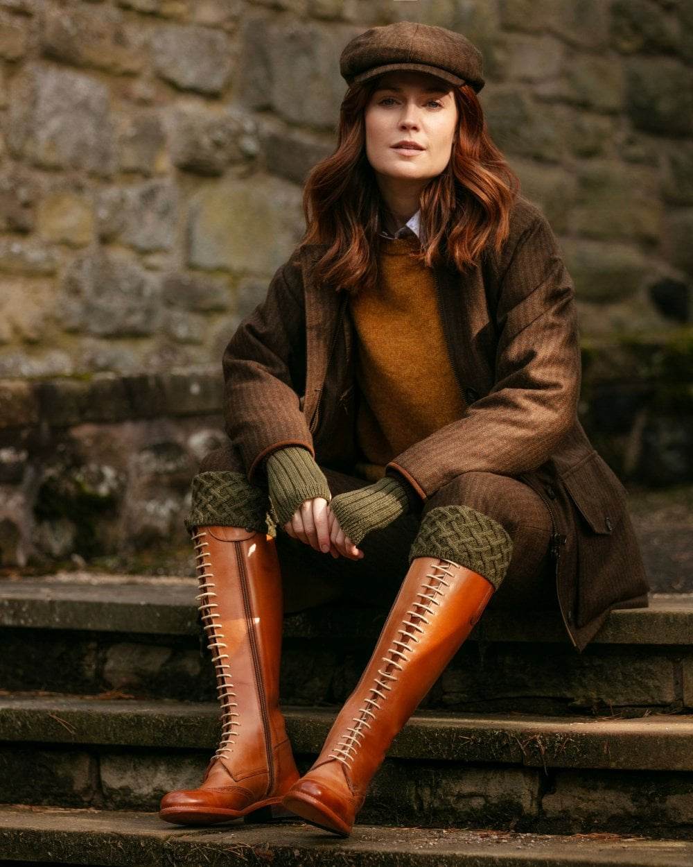 Dark Olive coloured House of Cheviot Lady Rannoch Socks on stairs background 