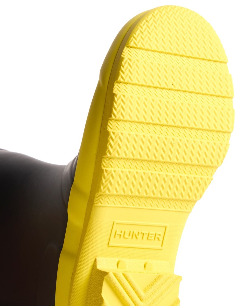 Black Illuminating Yellow coloured Hunter Big Kids Original Wellington Boots on white background 