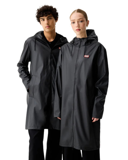 Black coloured Hunter Downpour Andrea PU Rain Coat on white background 