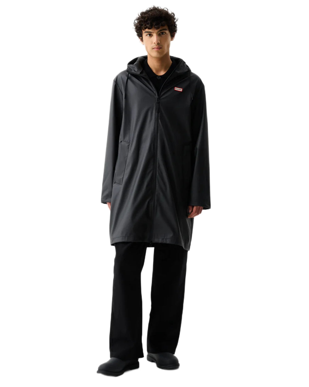 Black coloured Hunter Downpour Andrea PU Rain Coat on white background 