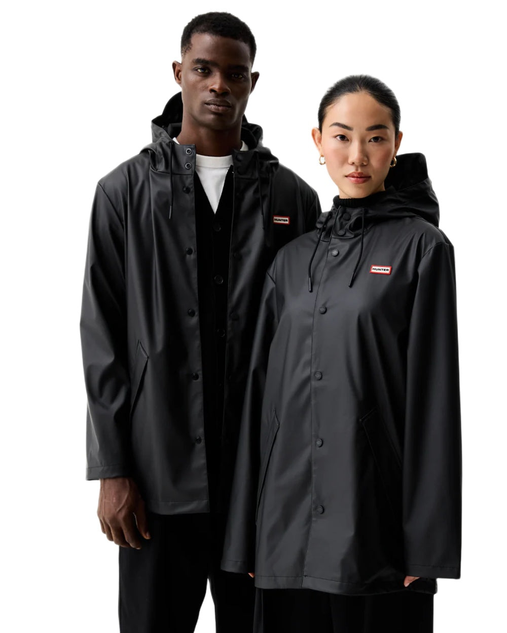 Black coloured Hunter Downpour Jo Pu Rain Parka on white background 