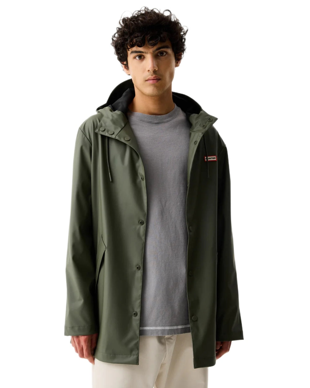 Kambaba Green coloured Hunter Downpour Jo Pu Rain Parka on white background 