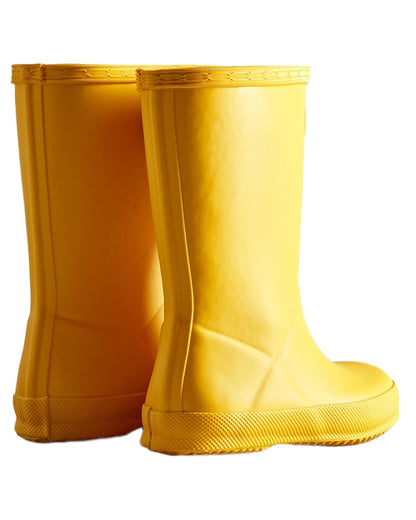 Hunter Yellow coloured Hunter Kids First Classic Wellingtons on white background 