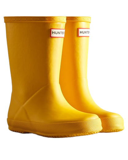 Hunter Yellow coloured Hunter Kids First Classic Wellingtons on white background 
