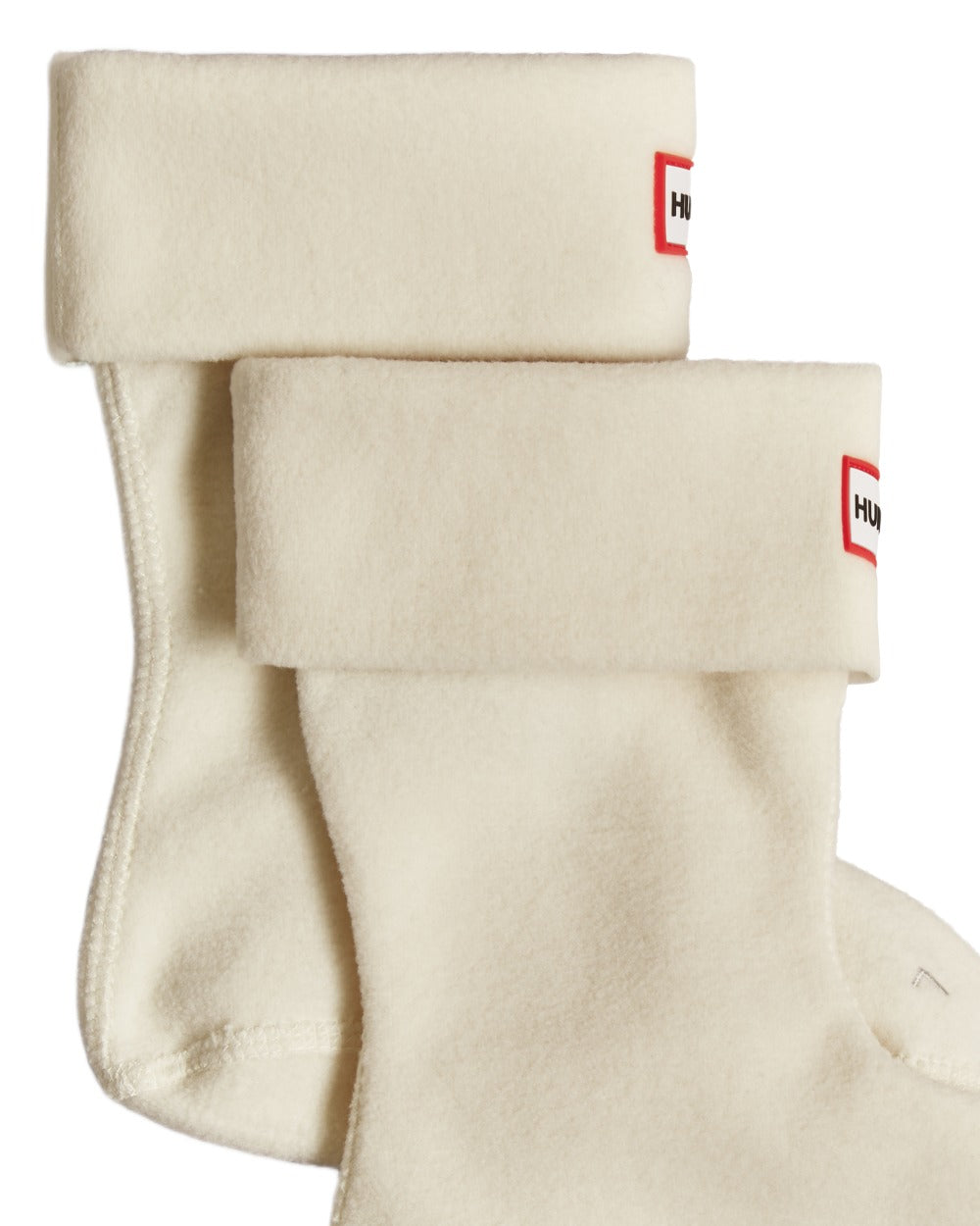 White coloured Hunter Kids Recycled Fleece Cuff Boot Socks on white background 