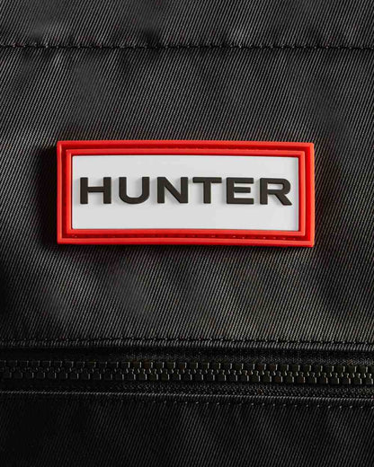 Black coloured Hunter Nylon Midi Topclip Tote Bag on white background 