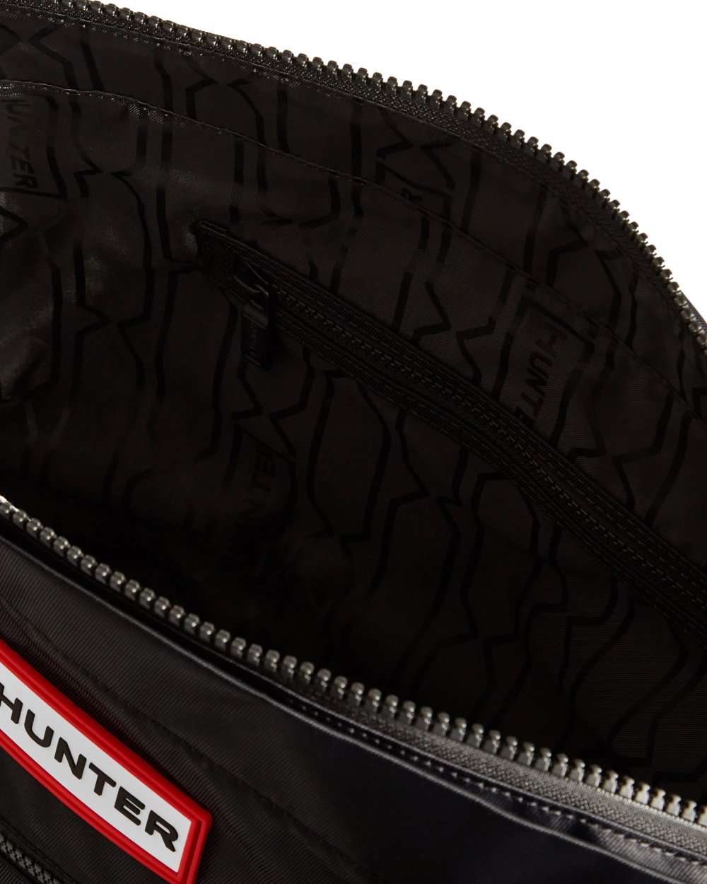 Black coloured Hunter Nylon Midi Topclip Tote Bag on white background 