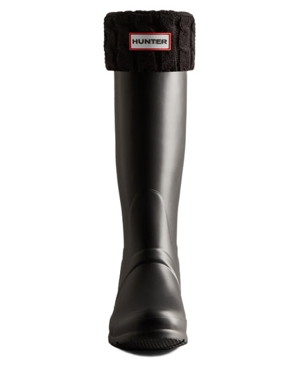 Black coloured Hunter Recycled 6 Stitch Cable Cuff Tall Boot Socks on white background 