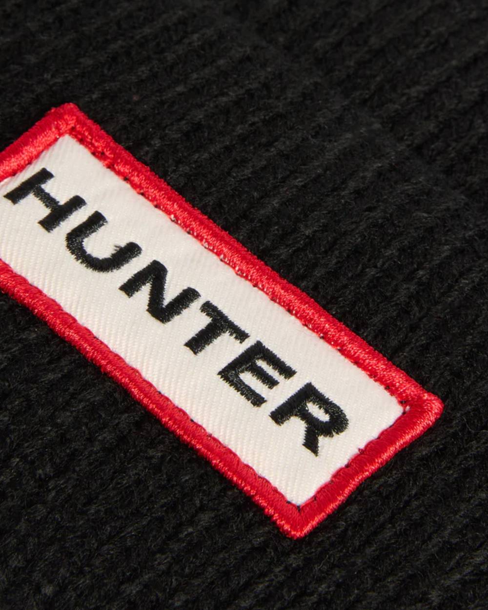 Black coloured Hunter Rory Turn Up Beanie on white background 