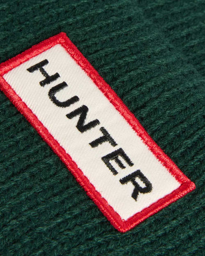 Hunter Green coloured Hunter Rory Turn Up Beanie on white background 