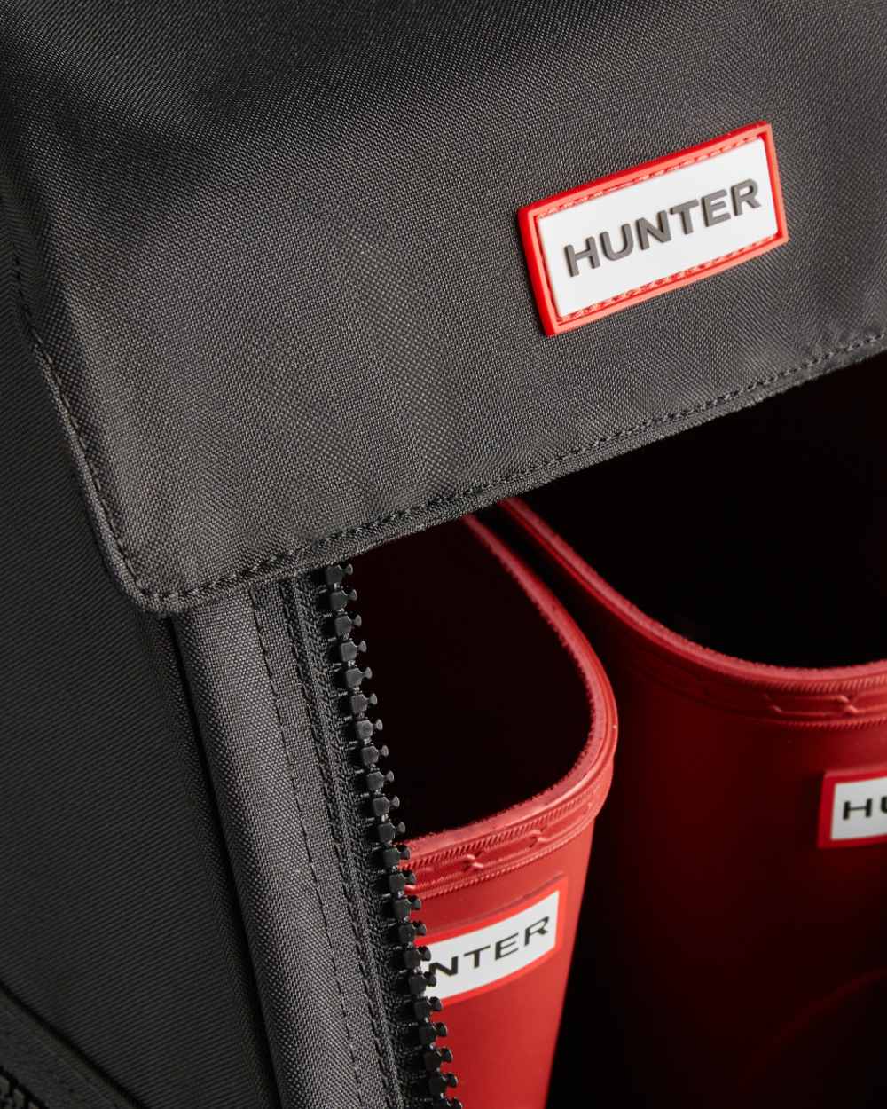 Black coloured Hunter Short Boot Bag on white background 