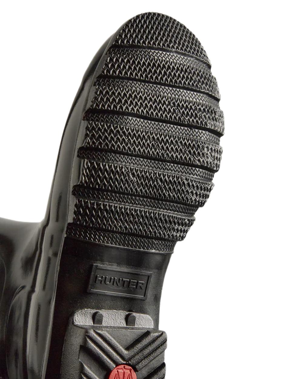 Black coloured Hunter Womens Original Short Gloss Wellingtons on white background 