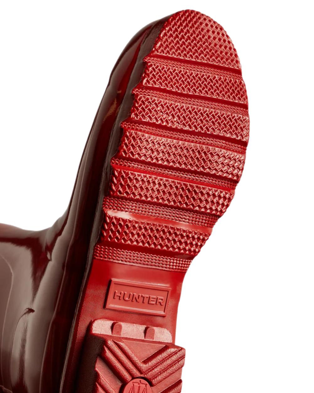 Military Red coloured Hunter Womens Original Short Gloss Wellingtons on white background 