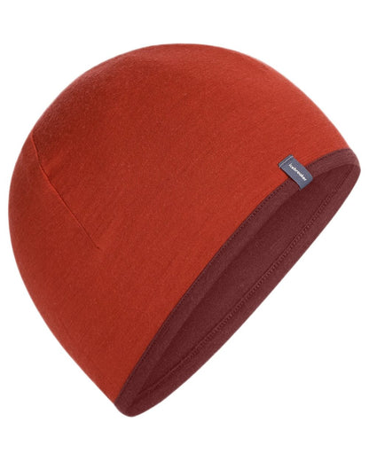 Agate Port coloured Icebreaker 200 Oasis Reversible Beanie on white background 