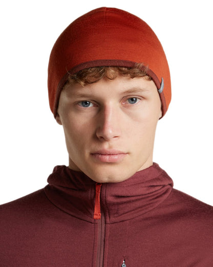 Agate Port coloured Icebreaker 200 Oasis Reversible Beanie on white background 