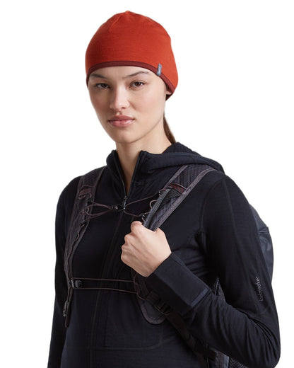 Agate Port coloured Icebreaker 200 Oasis Reversible Beanie on white background 