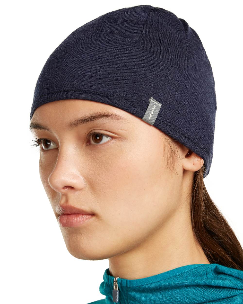Dark loden midnight navy coloured Icebreaker 200 Oasis Reversible Beanie on white background 