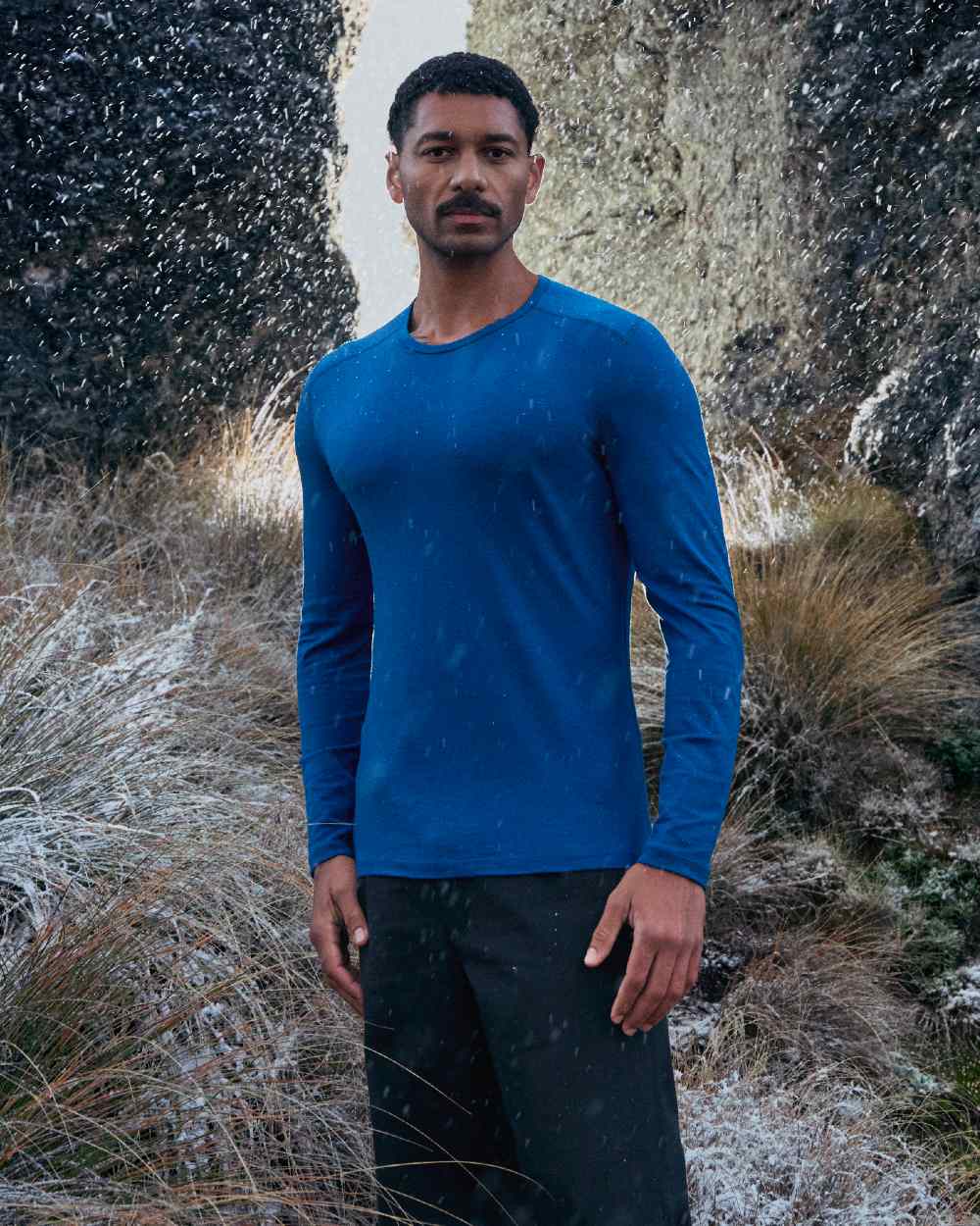Atlantis Coloured Icebreaker Mens Merino 200 Oasis Crewe Thermal Top on mountain background 