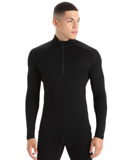 Black Coloured Icebreaker Mens Merino 260 Tech Half Zip Thermal Top on white background 