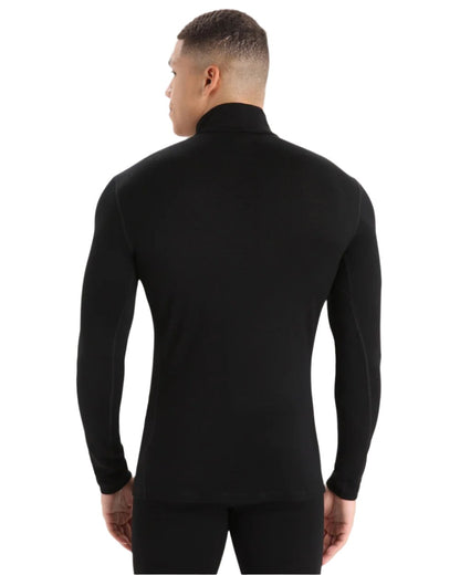 Black Coloured Icebreaker Mens Merino 260 Tech Half Zip Thermal Top on white background 