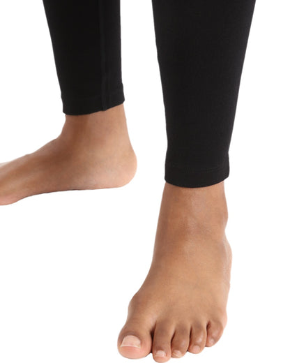 Black Coloured Icebreaker Merino Womens 260 Tech Thermal Leggings on white background 