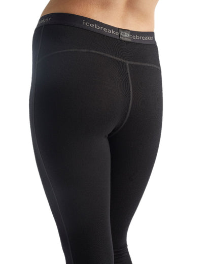 Black Coloured Icebreaker Merino Womens 260 Tech Thermal Leggings on white background 