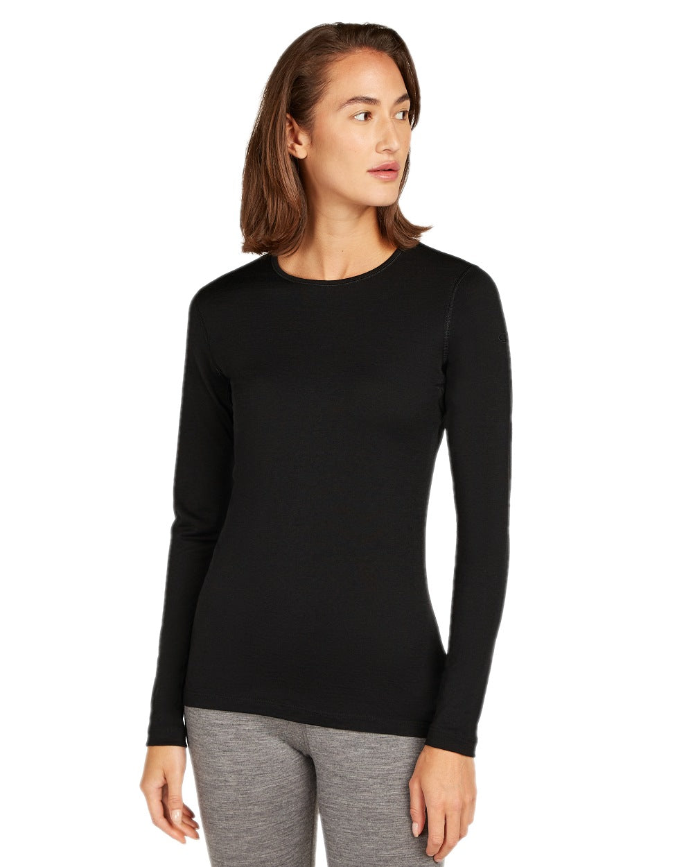 Black Coloured Icebreaker Womens Merino 200 Oasis Crewe Thermal Top on white background 