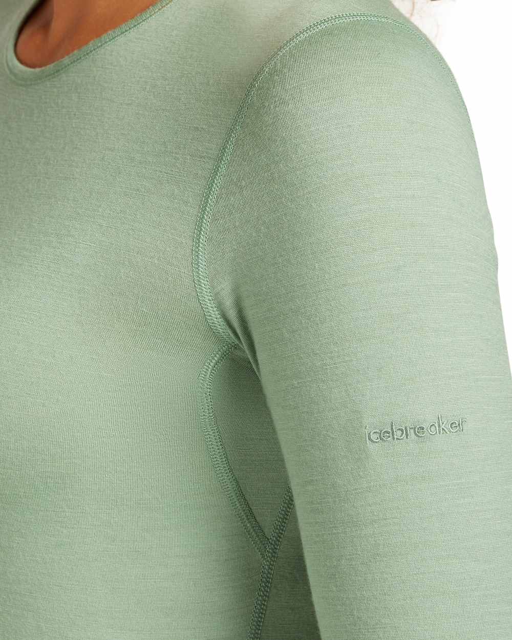 Sea Glass Coloured Icebreaker Womens Merino 200 Oasis Crewe Thermal Top on white background 