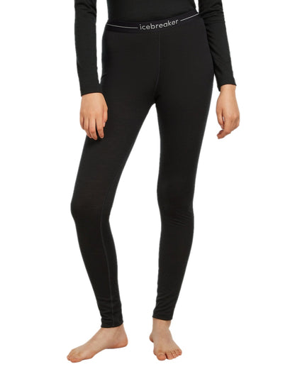 Black Coloured Icebreaker Womens Merino 200 Oasis Thermal Leggings on white background 