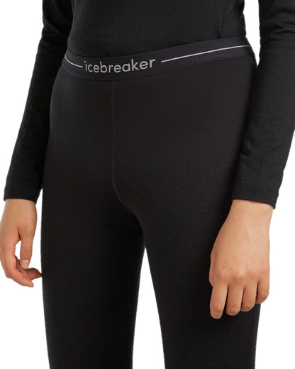 Black Coloured Icebreaker Womens Merino 200 Oasis Thermal Leggings on white background 
