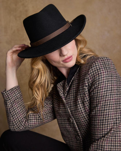 Black Coloured Jack Murphy Boston Crushable Felt Hat on indoor background 