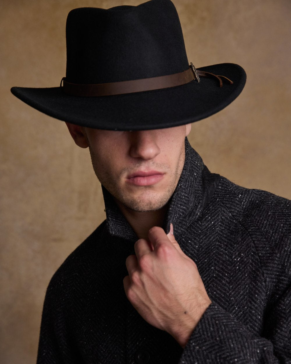 Black Coloured Jack Murphy Boston Crushable Felt Hat on indoor background 