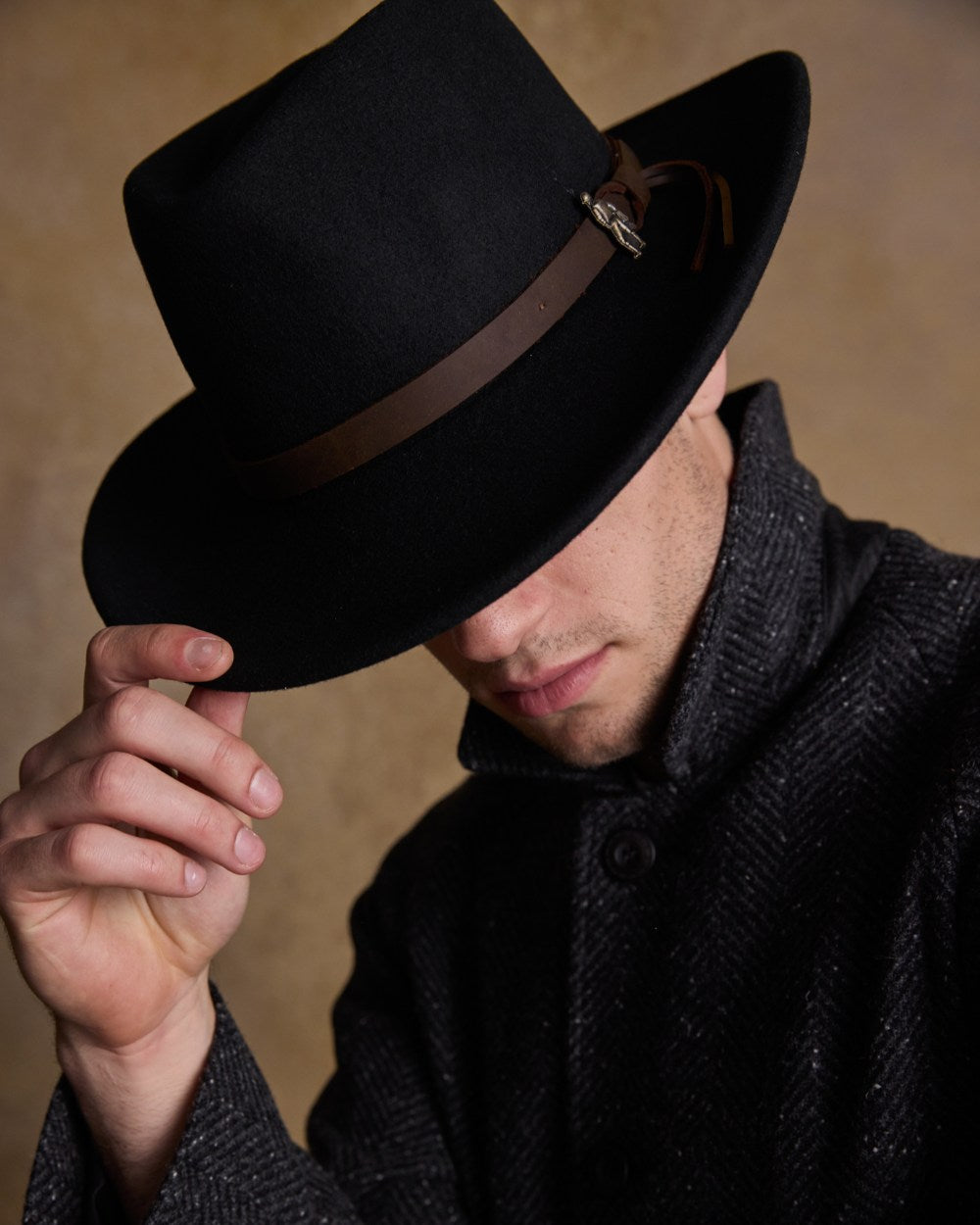 Black Coloured Jack Murphy Boston Crushable Felt Hat on indoor background 