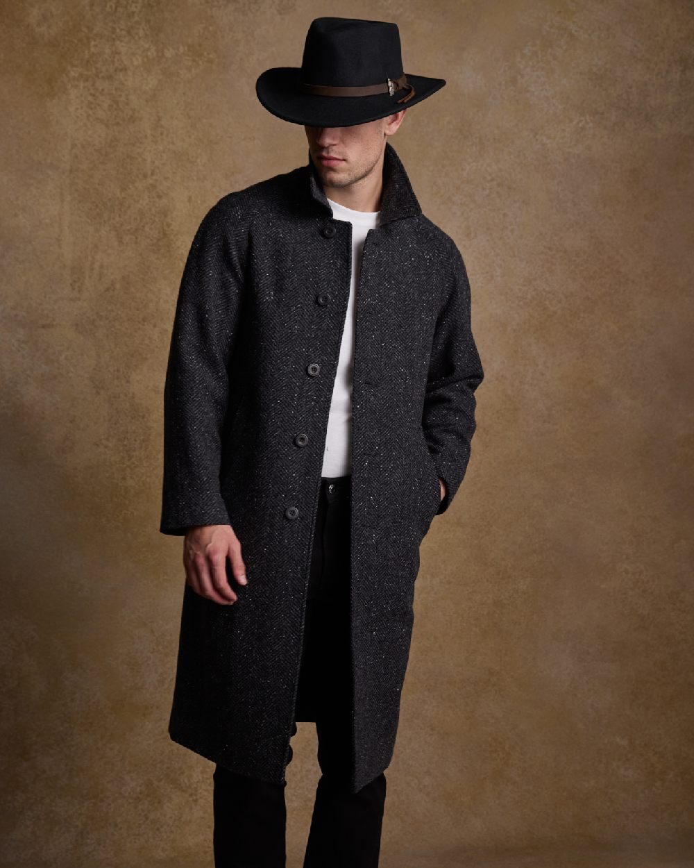 Black Coloured Jack Murphy Boston Crushable Felt Hat on indoor background 