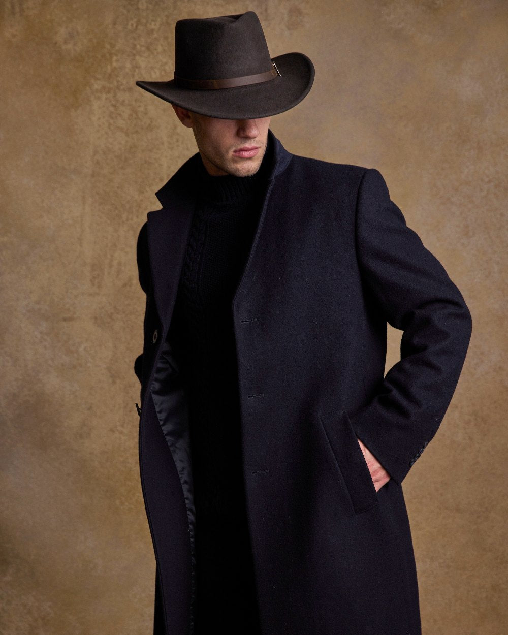 Brown Coloured Jack Murphy Boston Crushable Felt Hat on indoor background 