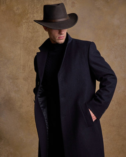 Brown Coloured Jack Murphy Boston Crushable Felt Hat on indoor background 