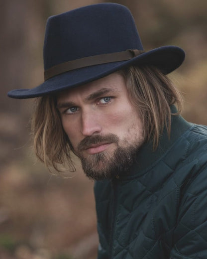 Navy Coloured Jack Murphy Boston Crushable Felt Hat on outdoor background 