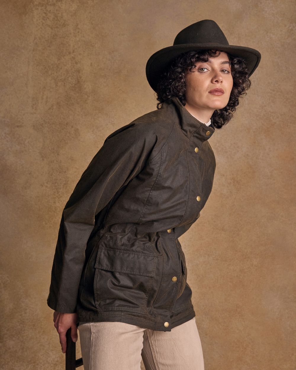 Olive Coloured Jack Murphy Boston Crushable Felt Hat on indoor background 