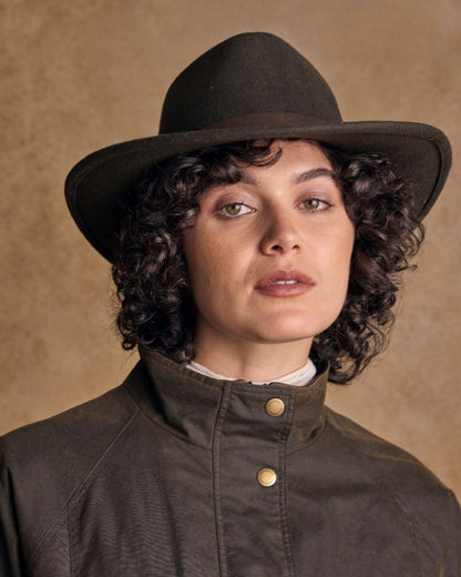 Olive Coloured Jack Murphy Boston Crushable Felt Hat on indoor background 